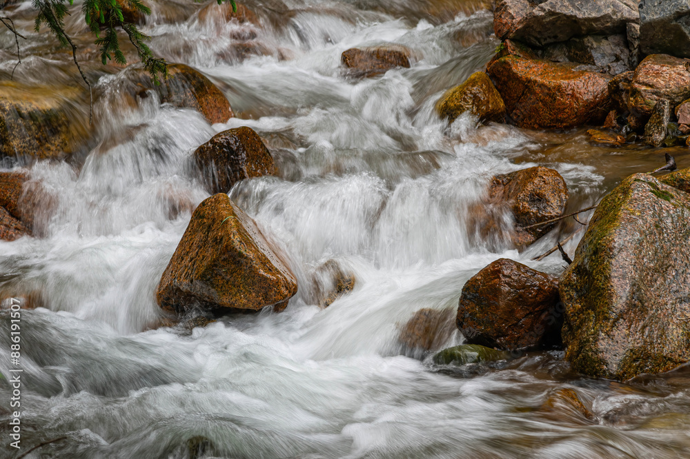 water flowing over rocks water flowing over rocks