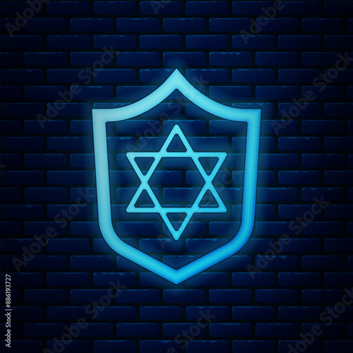 Glowing neon Shield with Star of David icon isolated on brick wall background. Jewish religion symbol. Symbol of Israel. Vector