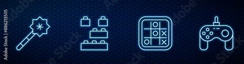 Set line Tic tac toe game, Magic wand, Toy building block bricks and Gamepad. Glowing neon icon on brick wall. Vector
