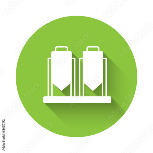 White Traditional brewing vessels in brewery icon isolated with long shadow background. Beer brewing process. Distillery plant, brewery. Green circle button. Vector