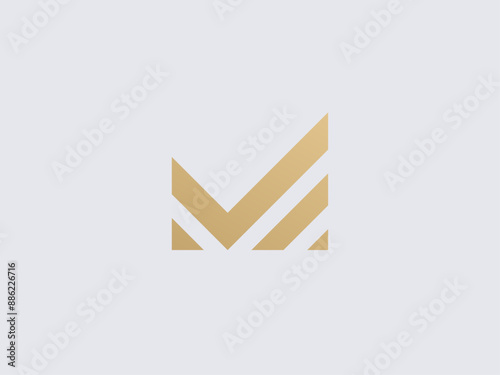 Luxury letter M logo design. Linear creative golden monogram. M with check mark logo concept. Premium elegant vector logotype