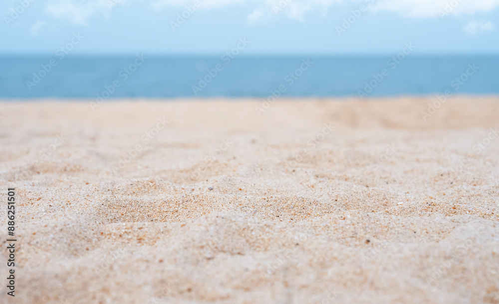 Sand Beach with blurry sky blue, cloud Background,Summer Sea beach with wave sand, blurred blue ocean water.Nature landscape of beautiful tropical seaside in sunny day.Vacation Travel,Holiday concept Sand Beach with blurry sky blue, cloud Background,Summer Sea beach with wave sand, blurred blue ocean water.Nature landscape of beautiful tropical seaside in sunny day.Vacation Travel,Holiday concept