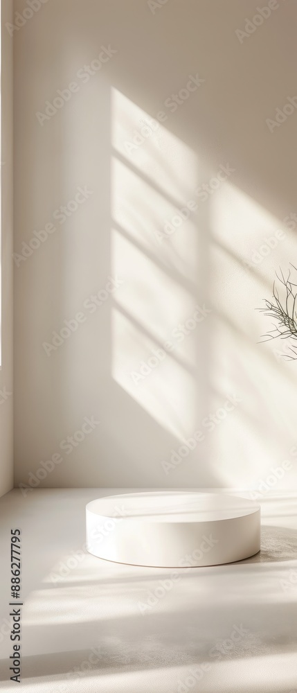 A white pedestal with a plant on top of it A white pedestal with a plant on top of it