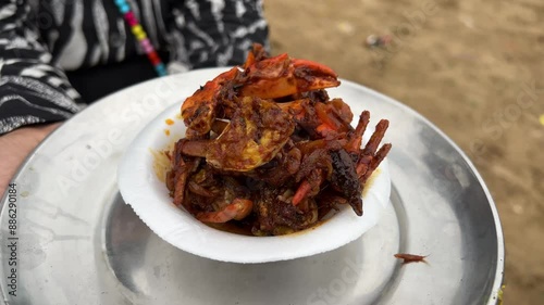 Spicy red crab prepared in a beach in Digha, India. photo