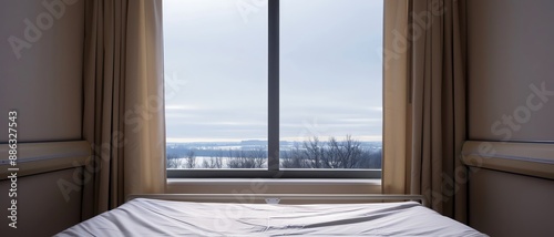 A patient s hospital bed with a view of a oncethriving hospital wing, now closed due to bankruptcy photo