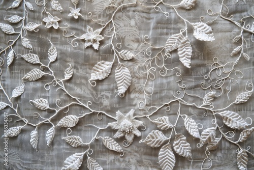 A white fabric intricately decorated with delicate lacework in the form of intertwining vines, leaves, and flowers, Delicate lacework in the form of intertwining vines and leaves photo