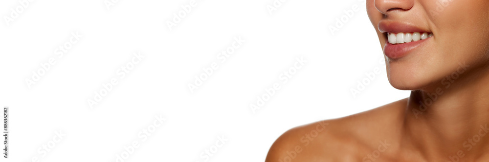 Obraz premium Cropped image of female face, perfect chick, plump lips and white teeth, woman smiling isolated on white background. Concept of female beauty, skin and body care, cosmetology and cosmetics. Banner