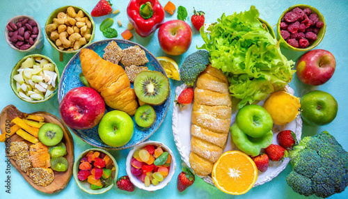 Healthy and unhealthy food background from fruits and vegetables vs fast food, sweets and pastry top view. Diet and detox against calorie and overweight lifestyle concept.