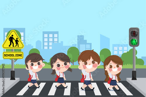 Cute School kids with backpack walking crossing road near pedestrian traffic light on zebra cross way to school at School warning sign.