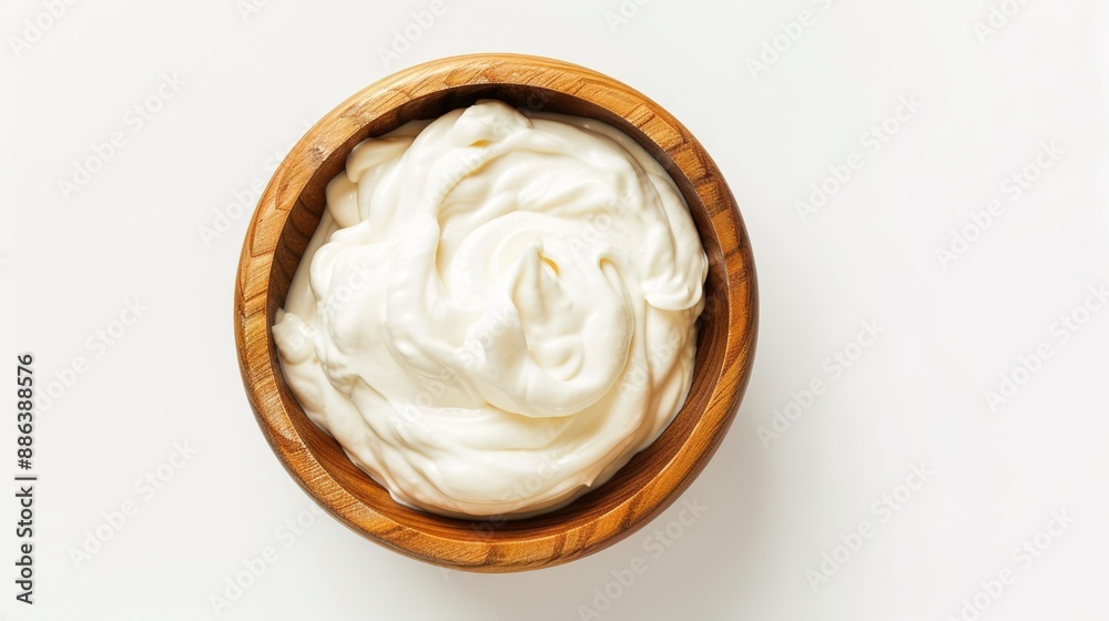Creamy Sour Cream in Wooden Bowl on White Background. Fresh Dairy Product for Culinary Use Creamy Sour Cream in Wooden Bowl on White Background. Fresh Dairy Product for Culinary Use