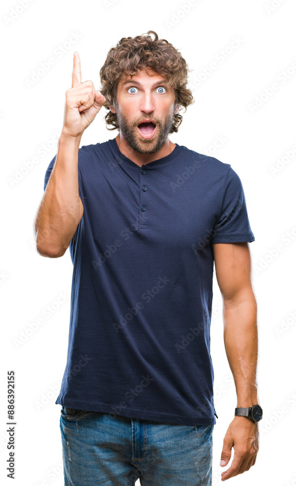 Handsome hispanic model man over isolated background pointing finger up with successful idea. Exited and happy. Number one. Handsome hispanic model man over isolated background pointing finger up with successful idea. Exited and happy. Number one.