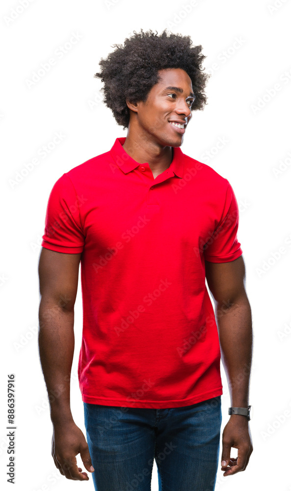 Afro american man over isolated background looking away to side with smile on face, natural expression. Laughing confident. Afro american man over isolated background looking away to side with smile on face, natural expression. Laughing confident.