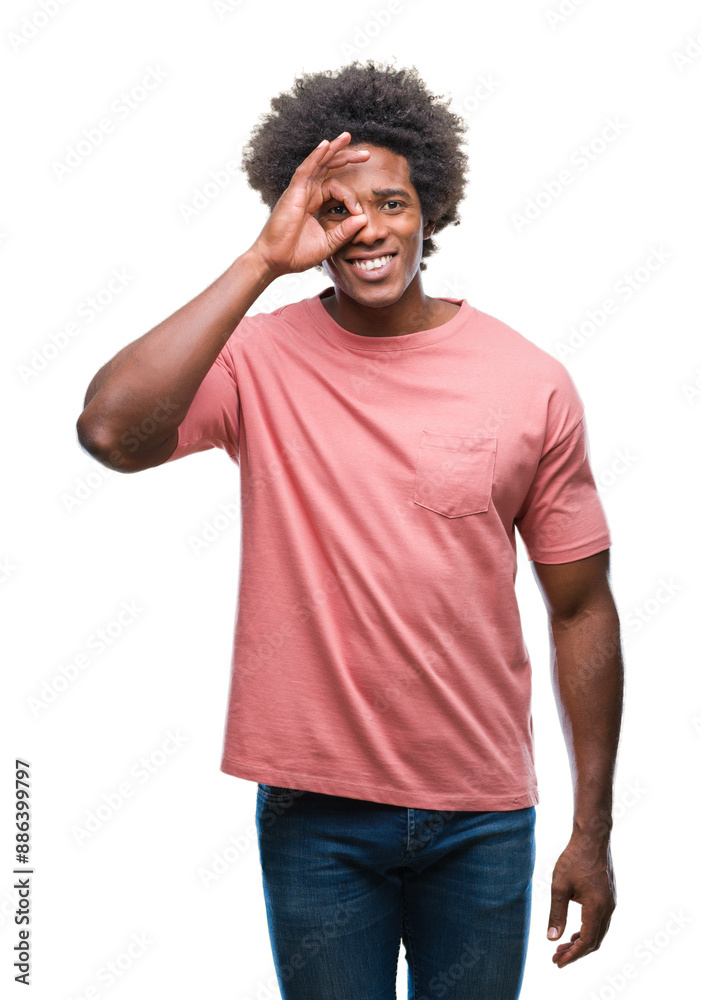 Afro american man over isolated background doing ok gesture with hand smiling, eye looking through fingers with happy face. Afro american man over isolated background doing ok gesture with hand smiling, eye looking through fingers with happy face.