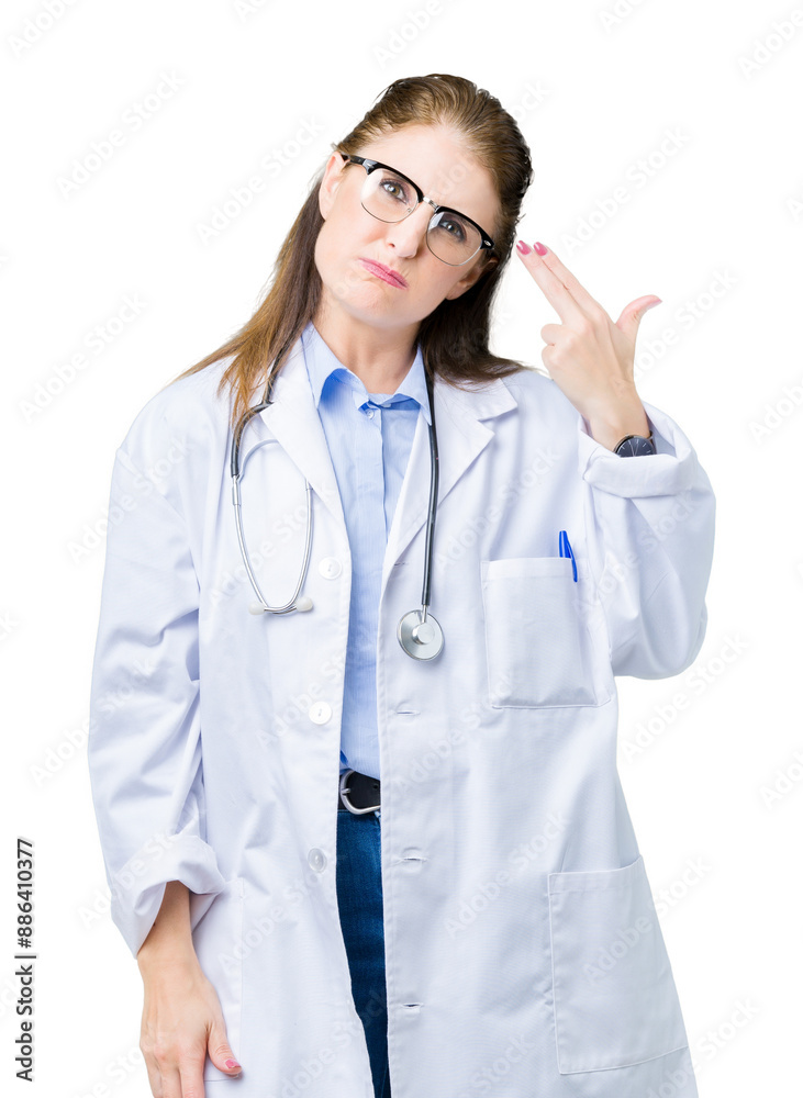 Middle age mature doctor woman wearing medical coat over isolated background Shooting and killing oneself pointing hand and fingers to head, suicide gesture. Middle age mature doctor woman wearing medical coat over isolated background Shooting and killing oneself pointing hand and fingers to head, suicide gesture.