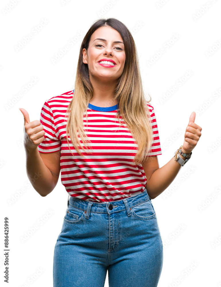 Young beautiful woman casual look over isolated background success sign doing positive gesture with hand, thumbs up smiling and happy. Looking at the camera with cheerful expression, winner gesture. Young beautiful woman casual look over isolated background success sign doing positive gesture with hand, thumbs up smiling and happy. Looking at the camera with cheerful expression, winner gesture.