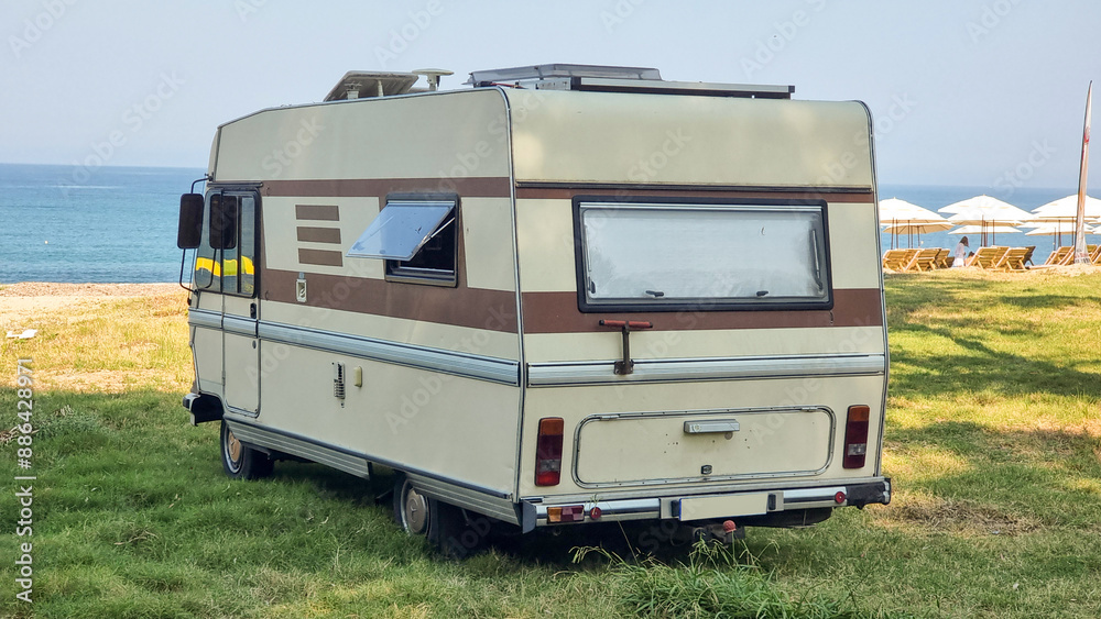 car caravan by the sea retro old style