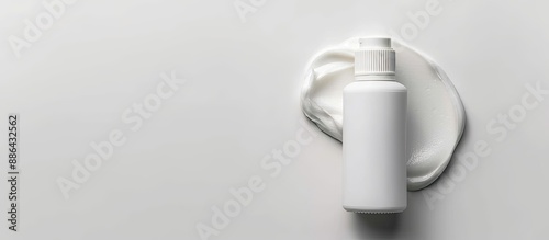 Cream bottle placed on a wh...