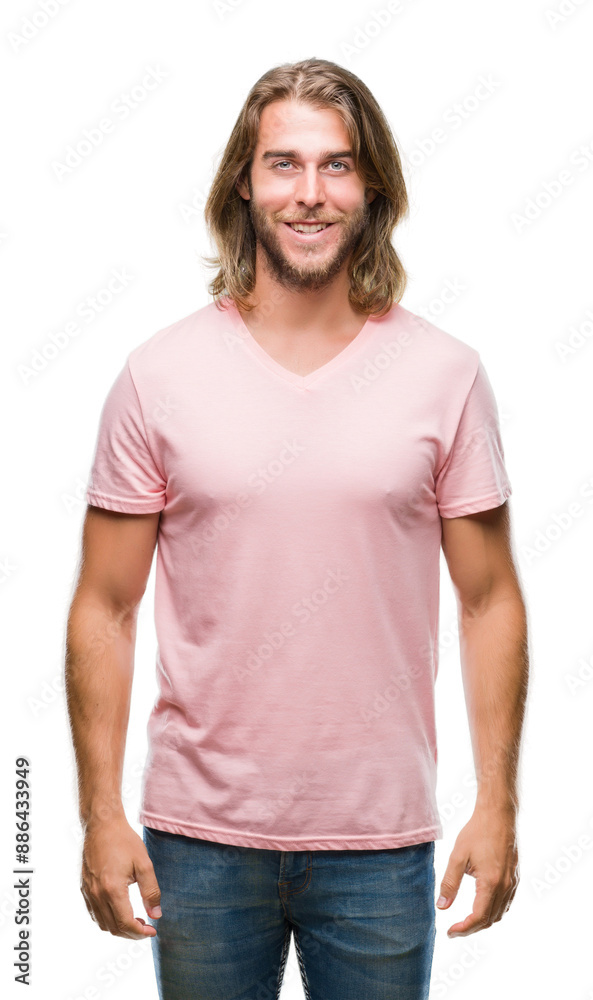 Obraz premium Young handsome man with long hair over isolated background with a happy and cool smile on face. Lucky person.