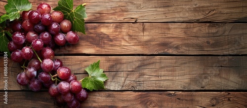 Grape placed on a wooden ta...