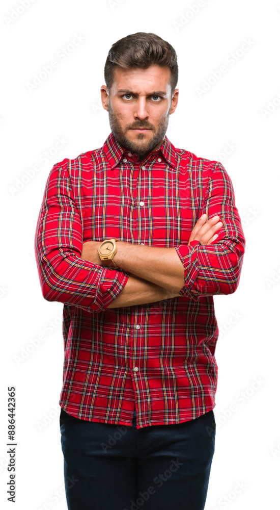 Young handsome man over isolated background skeptic and nervous, disapproving expression on face with crossed arms. Negative person. Young handsome man over isolated background skeptic and nervous, disapproving expression on face with crossed arms. Negative person.