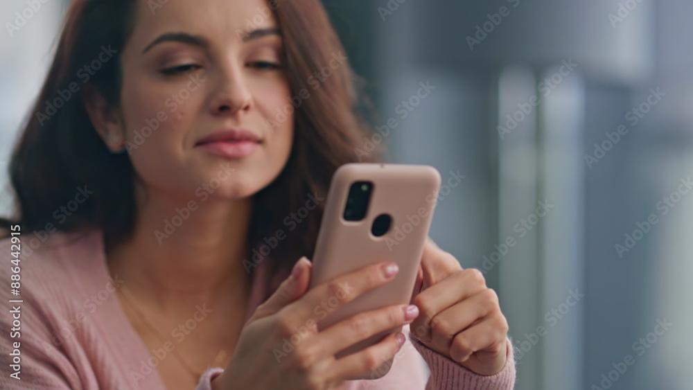 Relaxed woman reading cellphone at modern kitchen closeup. Carefree girl weekend Relaxed woman reading cellphone at modern kitchen closeup. Carefree girl weekend