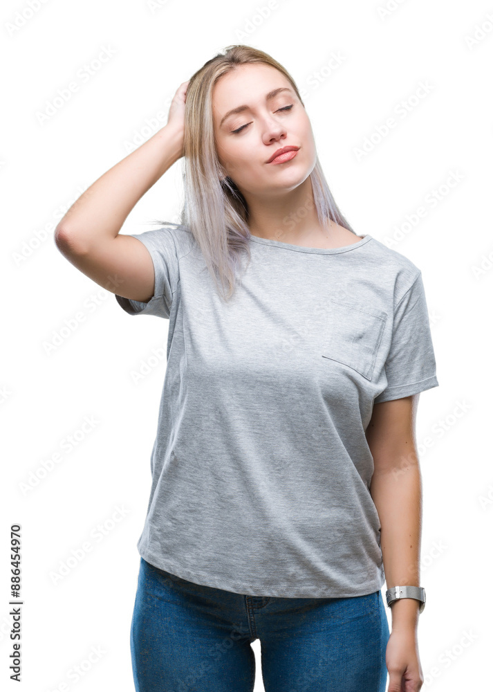 Fototapeta premium Young blonde woman over isolated background confuse and wonder about question. Uncertain with doubt, thinking with hand on head. Pensive concept.