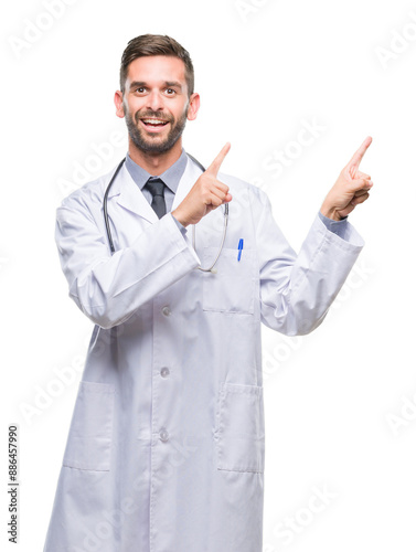 Young handsome doctor man over isolated background smiling and looking at the camera pointing with two hands and fingers to the side.