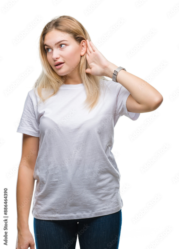 Young caucasian woman over isolated background smiling with hand over ear listening an hearing to rumor or gossip. Deafness concept. Young caucasian woman over isolated background smiling with hand over ear listening an hearing to rumor or gossip. Deafness concept.
