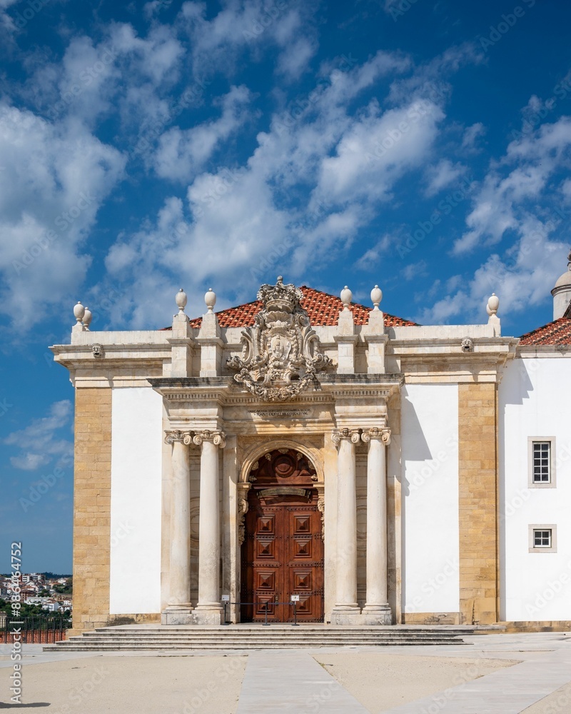 Fototapeta premium Facade of the University of Coimbra with a clear blue sky in Portugal