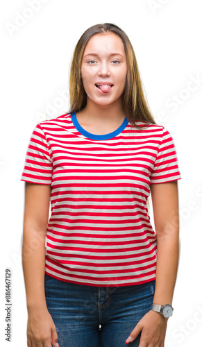 Young caucasian beautiful woman over isolated background sticking tongue out happy with funny expression. Emotion concept.