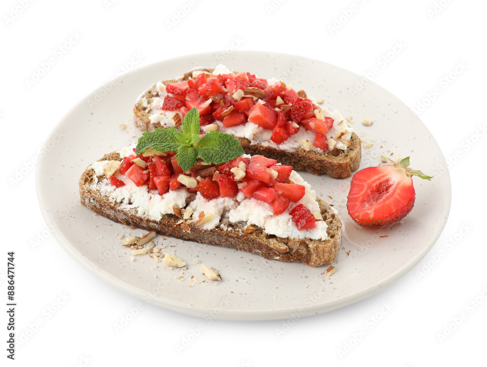 Delicious bruschettas with ricotta cheese, chopped strawberries and mint isolated on white Delicious bruschettas with ricotta cheese, chopped strawberries and mint isolated on white
