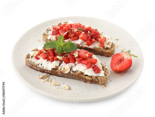 Delicious bruschettas with ricotta cheese, chopped strawberries and mint isolated on white