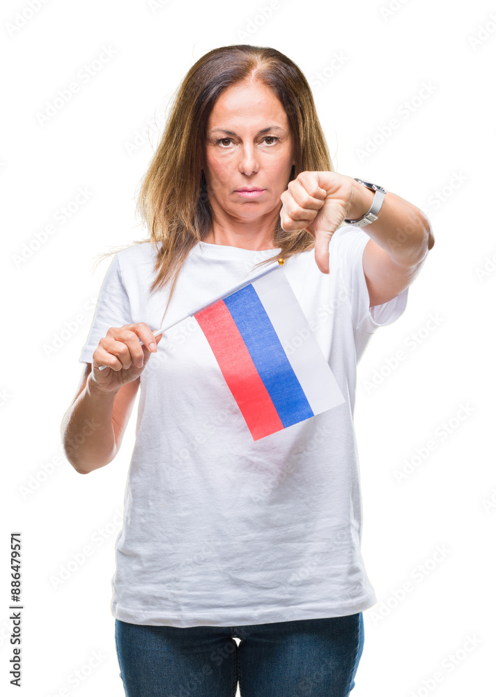 Middle age hispanic woman holding flag of Russia over isolated background with angry face, negative sign showing dislike with thumbs down, rejection concept Middle age hispanic woman holding flag of Russia over isolated background with angry face, negative sign showing dislike with thumbs down, rejection concept