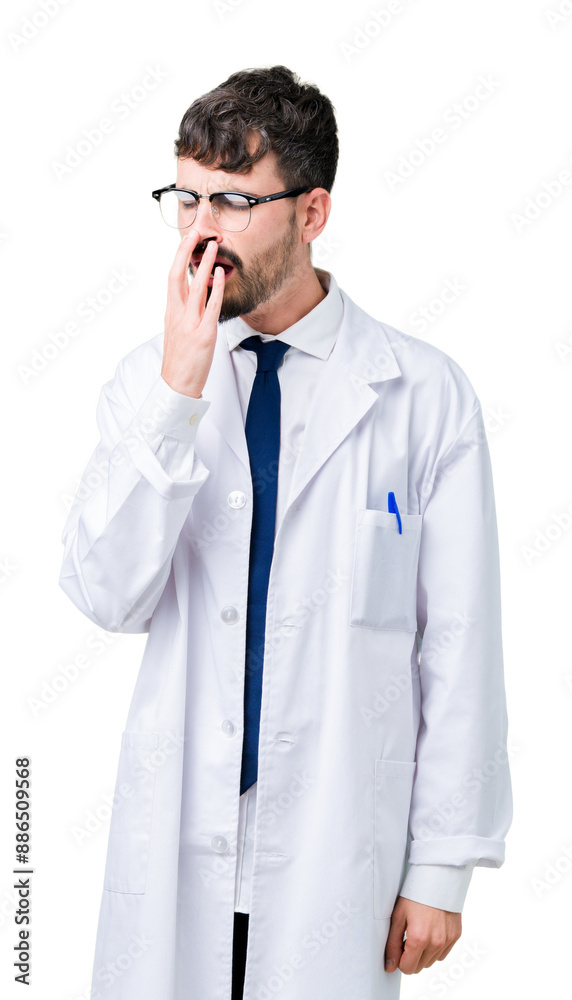 Young professional scientist man wearing white coat over isolated background bored yawning tired covering mouth with hand. Restless and sleepiness. Young professional scientist man wearing white coat over isolated background bored yawning tired covering mouth with hand. Restless and sleepiness.
