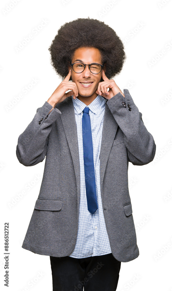 Young african american business man with afro hair wearing glasses covering ears with fingers with annoyed expression for the noise of loud music. Deaf concept. Young african american business man with afro hair wearing glasses covering ears with fingers with annoyed expression for the noise of loud music. Deaf concept.