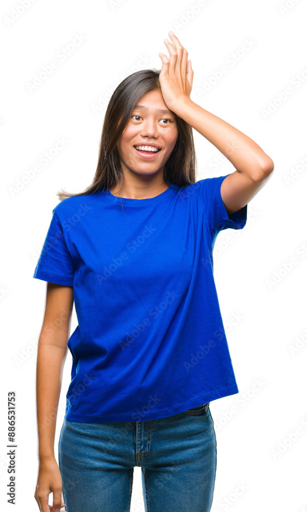 Young asian woman over isolated background surprised with hand on head for mistake, remember error. Forgot, bad memory concept. Young asian woman over isolated background surprised with hand on head for mistake, remember error. Forgot, bad memory concept.