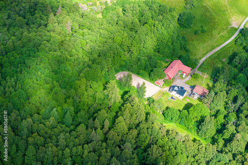 Aerial View of a House in the Forest Outside Gothenburg, Sweden photo