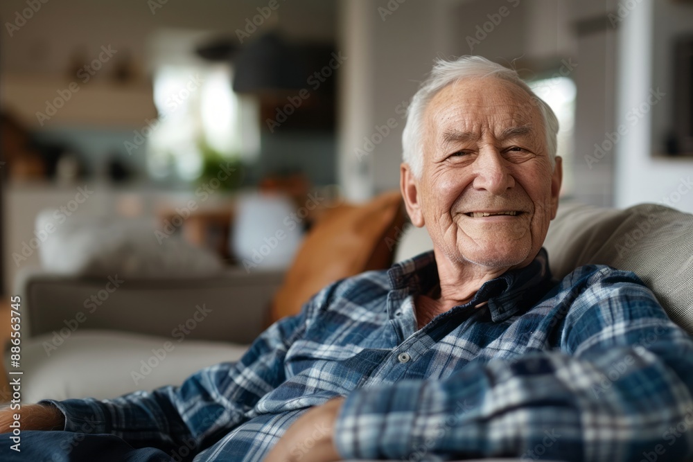 Senior man smiling at home Senior man smiling at home