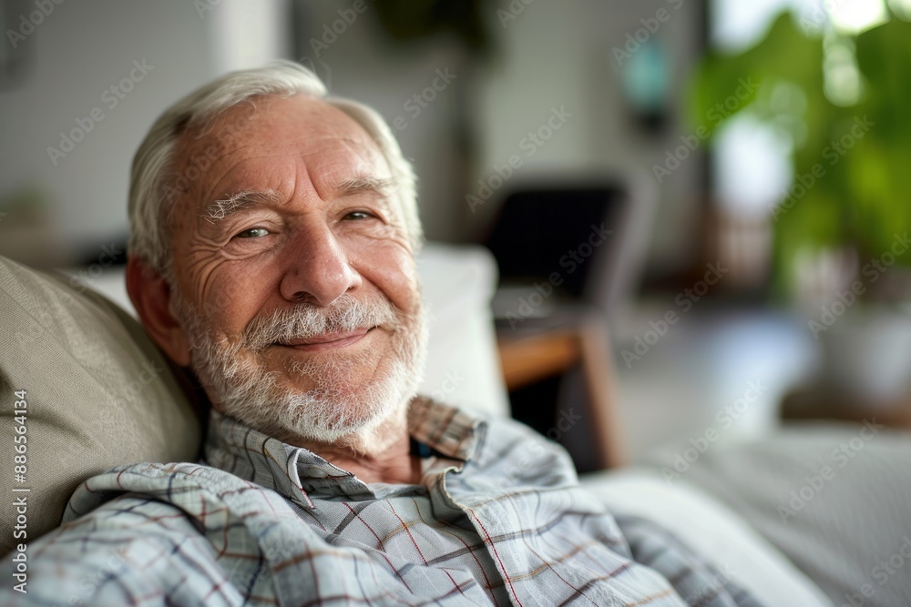 Portrait of senior man smiling at home Portrait of senior man smiling at home