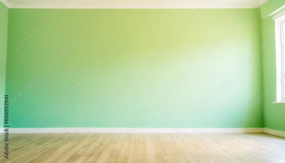 Light green wall in an empty room with a wooden floor Light green wall in an empty room with a wooden floor