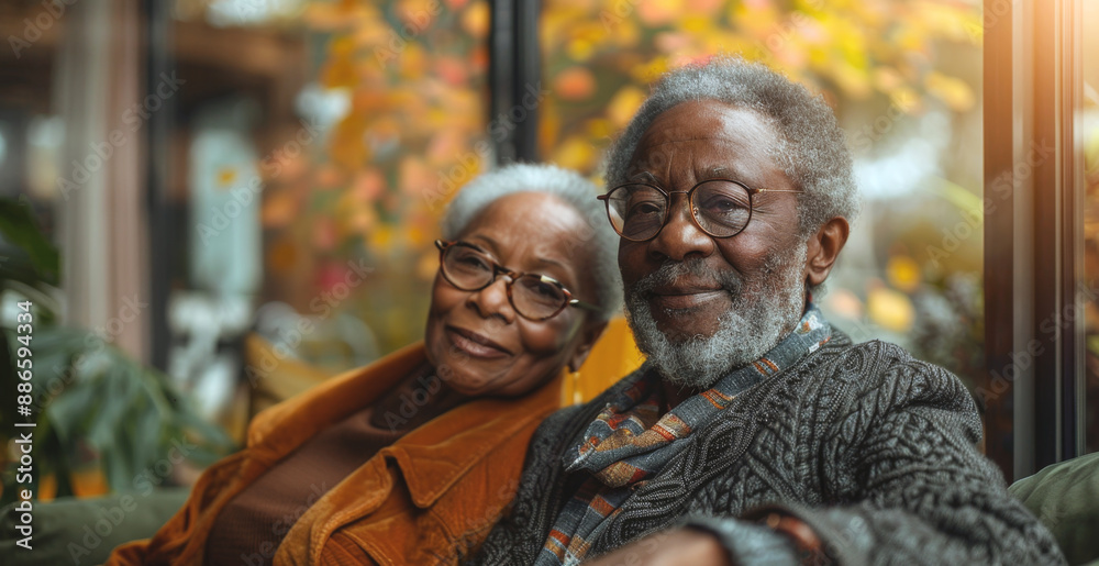 custom made wallpaper toronto digitalA senior couple sits together by a window, looking out at the view.