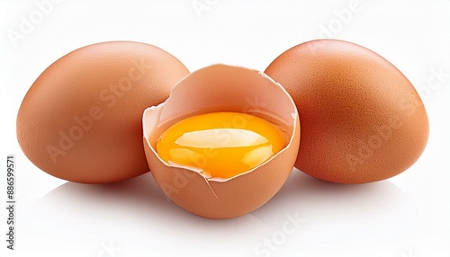 Brown chicken eggs and egg yolk isolated on white background. photo