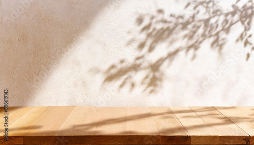 Wooden table mockup on stucco background with window shadow on the wall, beige earthy color tones