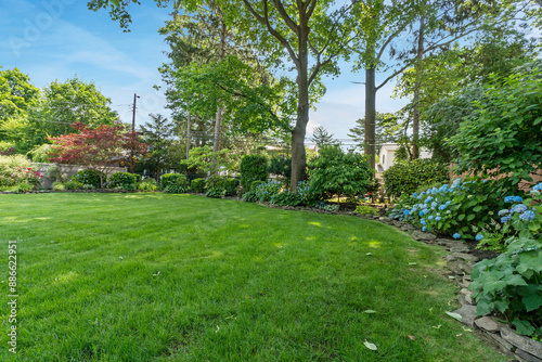 Beautiful Images of Backyard with Landscaping Pool Grass and Flowers