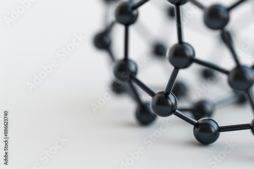 Abstract molecular structure with connected black spheres against a white background, symbolizing science, chemistry, and technology concepts.