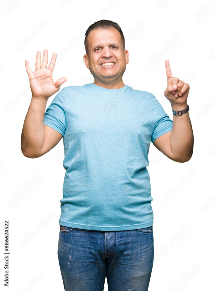 Fototapeta premium Middle age arab man wearing blue t-shirt over isolated background showing and pointing up with fingers number six while smiling confident and happy.