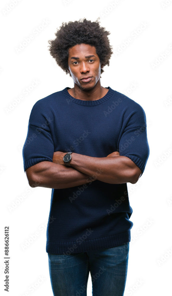 Afro american man over isolated background skeptic and nervous, disapproving expression on face with crossed arms. Negative person. Afro american man over isolated background skeptic and nervous, disapproving expression on face with crossed arms. Negative person.