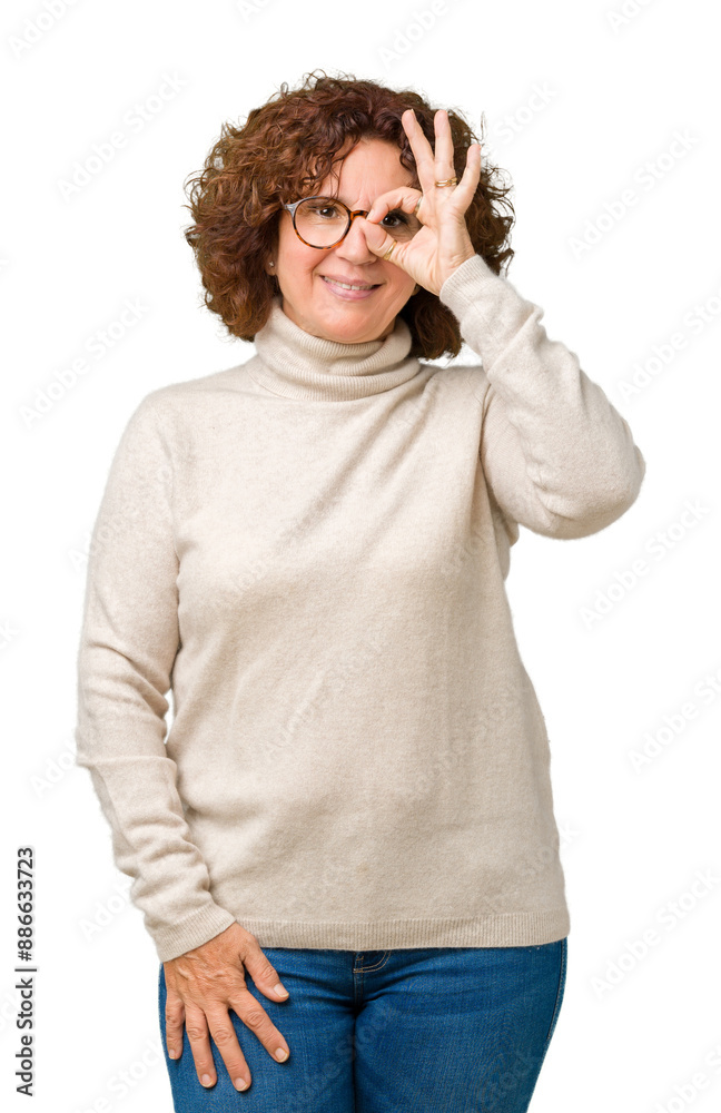 Beautiful middle ager senior woman wearing turtleneck sweater and glasses over isolated background doing ok gesture with hand smiling, eye looking through fingers with happy face. Beautiful middle ager senior woman wearing turtleneck sweater and glasses over isolated background doing ok gesture with hand smiling, eye looking through fingers with happy face.