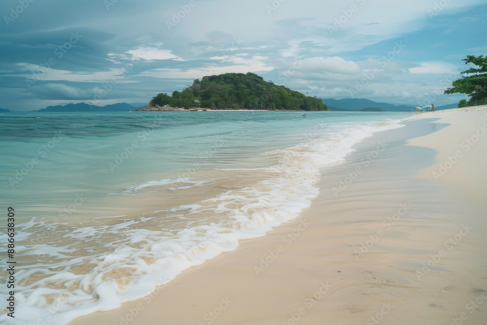 Tropical beach with crystal-clear waters and a sunny blue sky. Tropical beach with crystal-clear waters and a sunny blue sky.