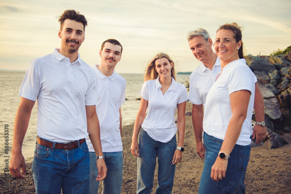 big family at beach on summer time, relax and support. Sunset, nature and smile with parents, kids walking by the sea for vacation